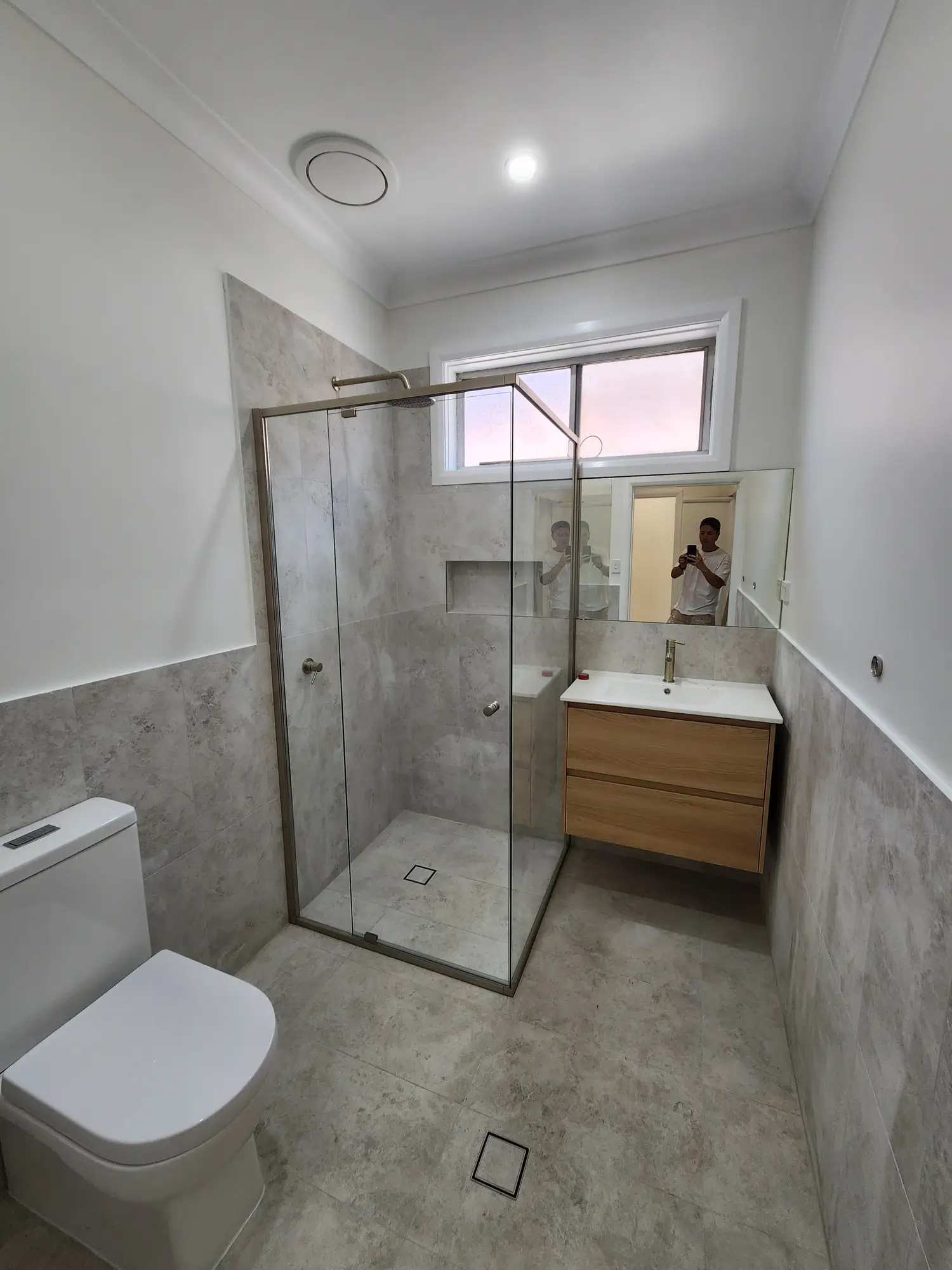 Finished bathroom repaint with a shower and vanity in Newcastle