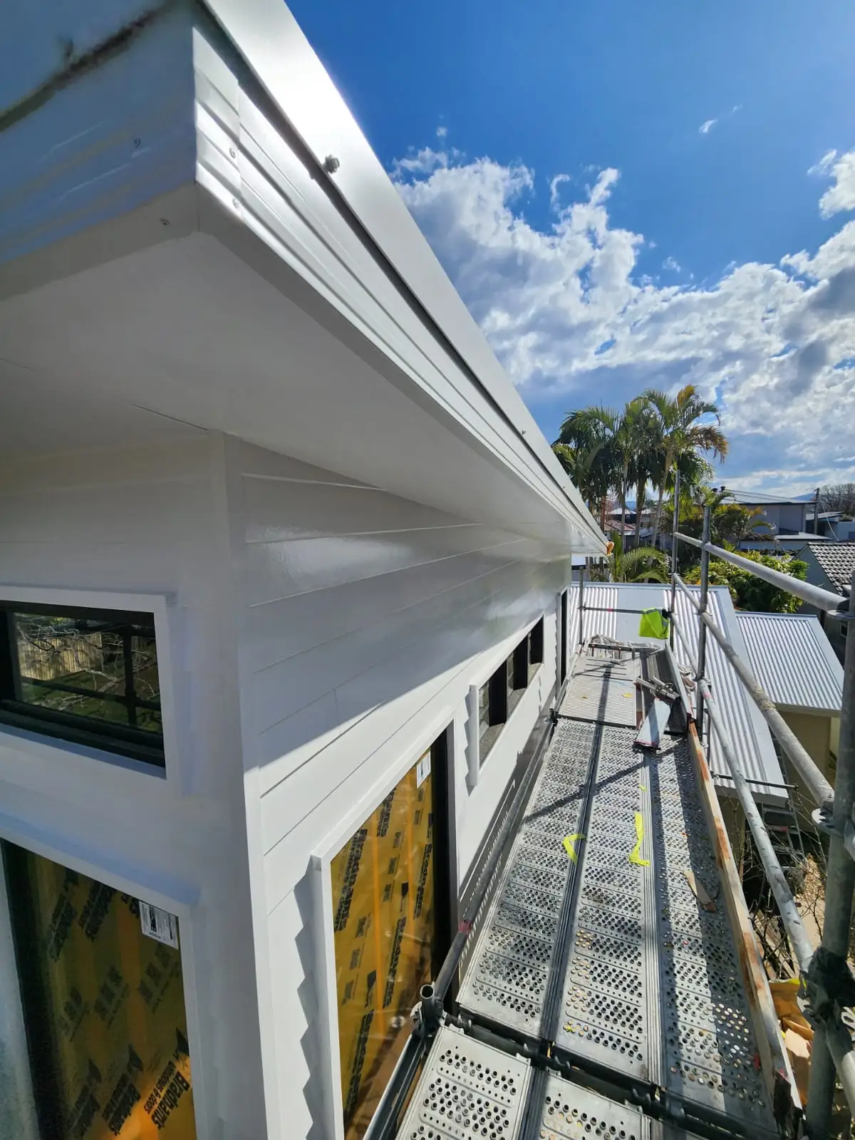 Freshly painted white eaves and fascia on a coastal Newcastle home