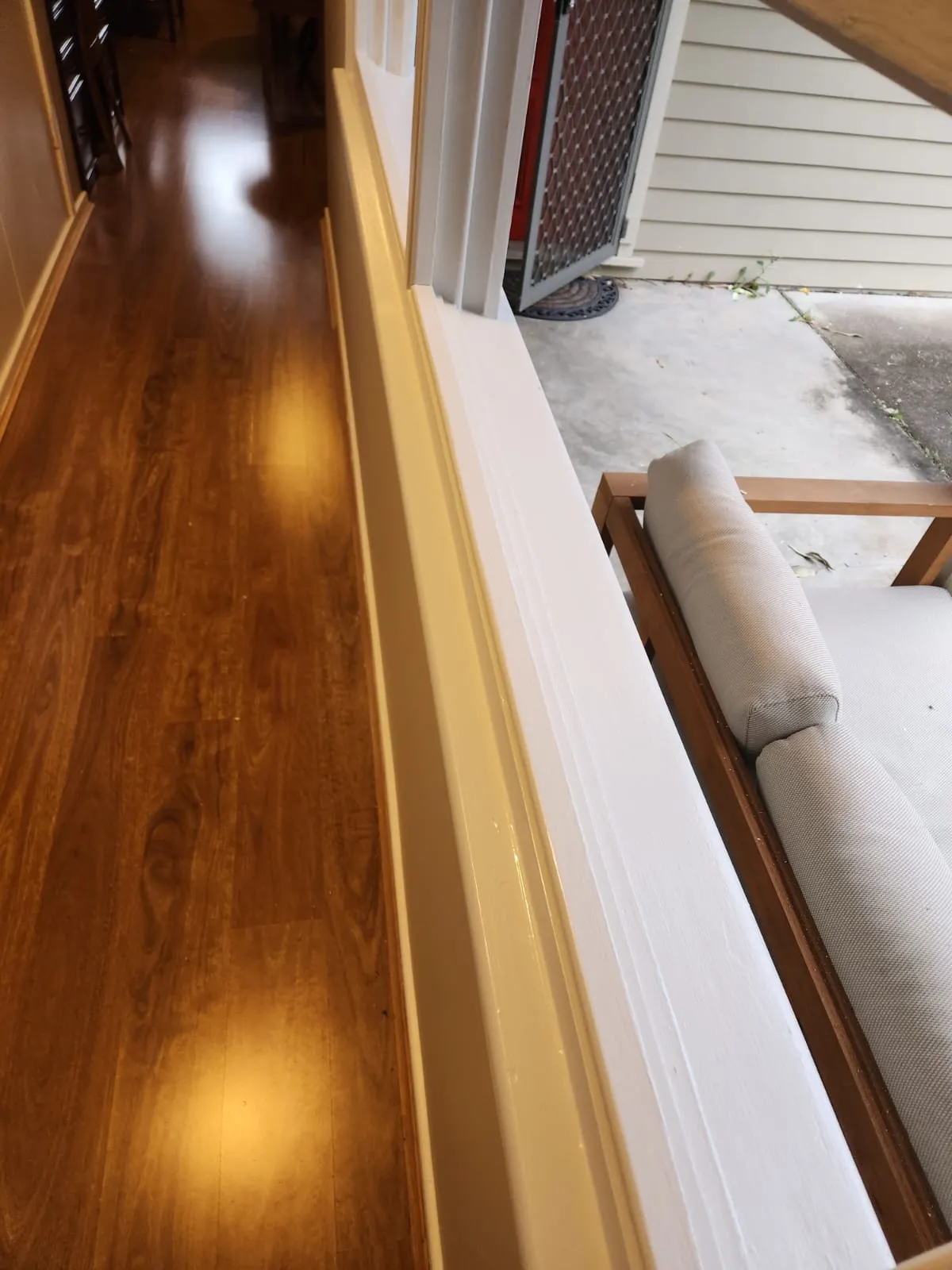 Living and dining area painted in white in a Newcastle home