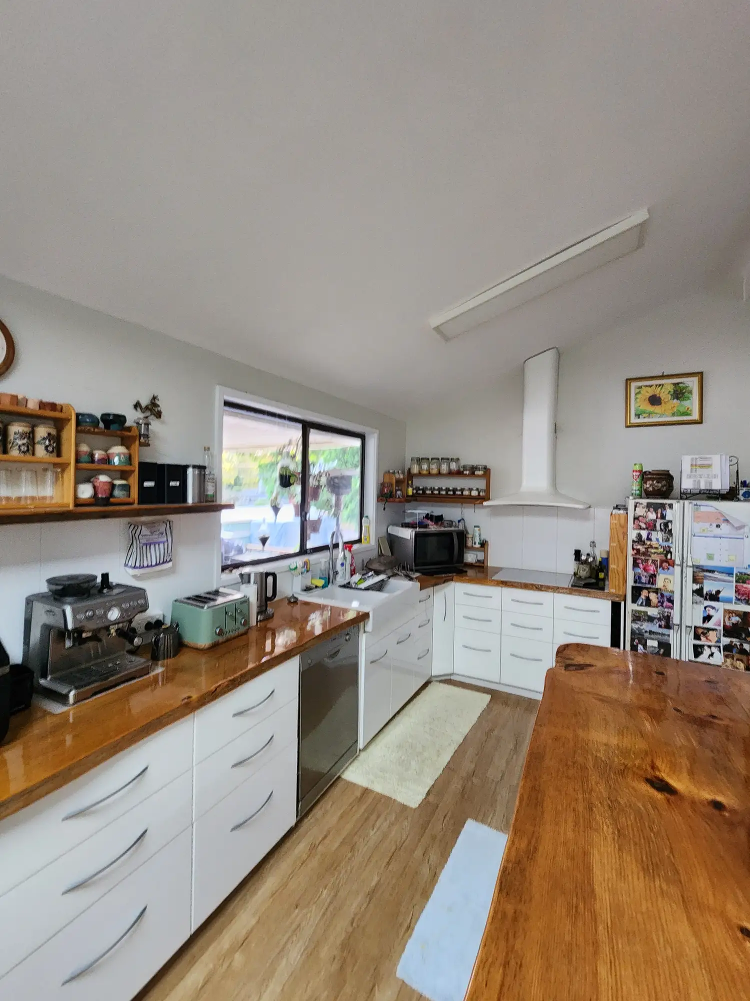 Kitchen with a raked ceiling prepared for repainting